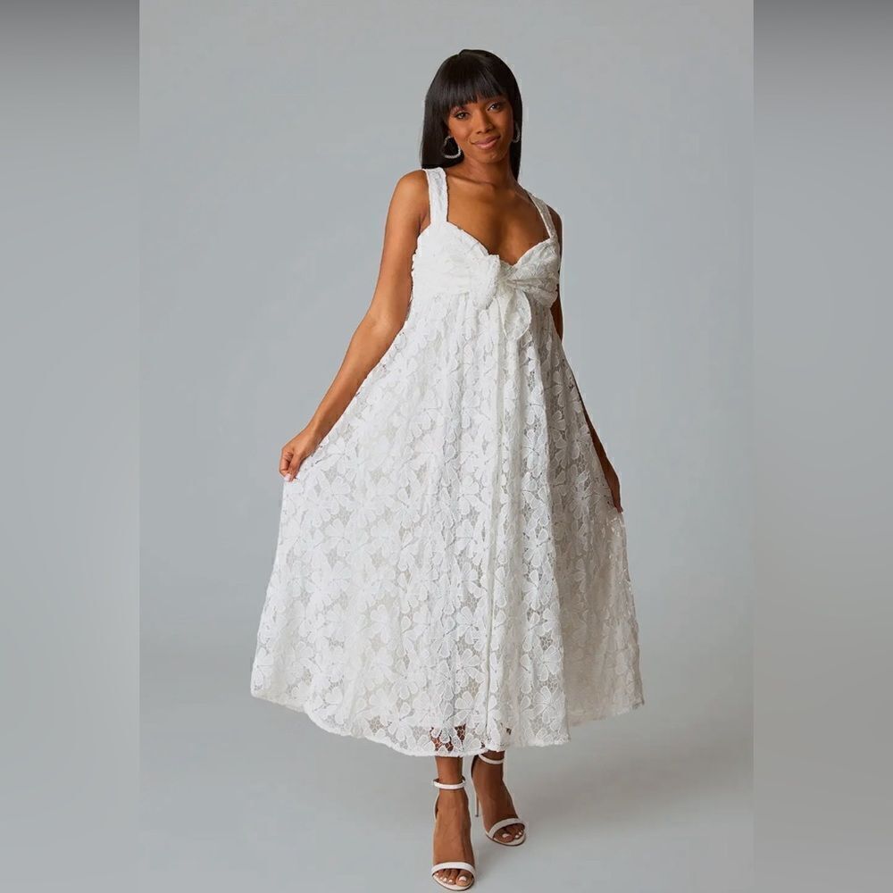 Perfect summer dress. White eyelet pattern sweetheart neckline. NWT